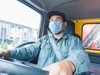 Delivery driver wearing a mask