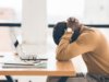 stressed employee at a desk
