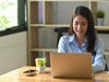 woman using a computer in a home office