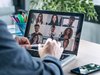 person having a video conference on a laptop